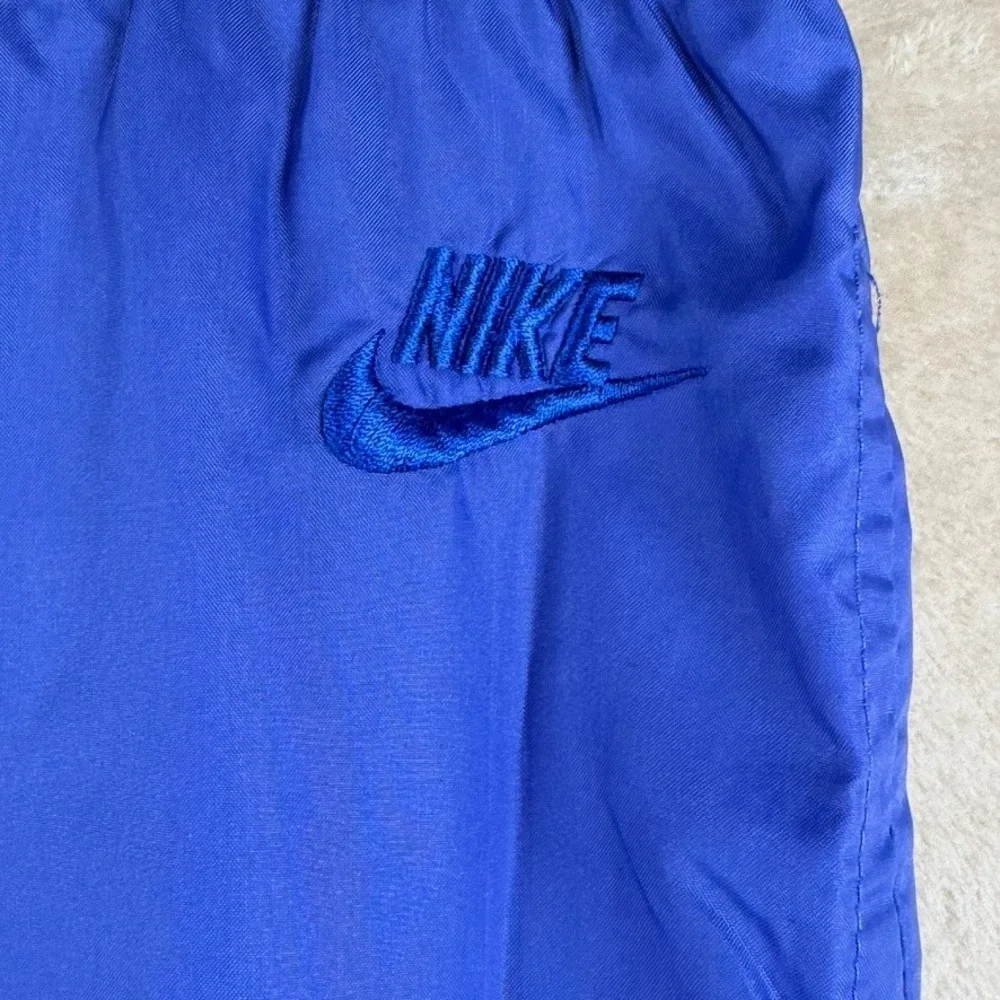 Vintage Nike Men L Royal Blue Windbreaker Track Pants Large Embroidered Logo 90s